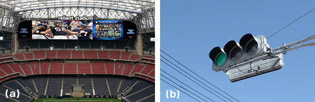 図２　LEDの応用製品 (a)屋外用大画面ディスプレイ（写真提供：三菱電機） (b)交通信号（写真提供：京三製作所）